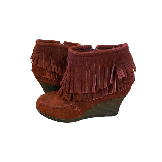 Minnetonka women's leather-fringe heeled boots